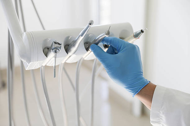Professional Dental Implants technician working in SUNY Oswego, NY